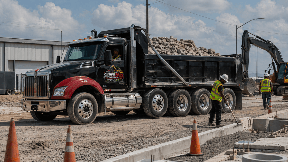 Silverback dump truck loaded with aggregate on a Caddo Parish jobsite